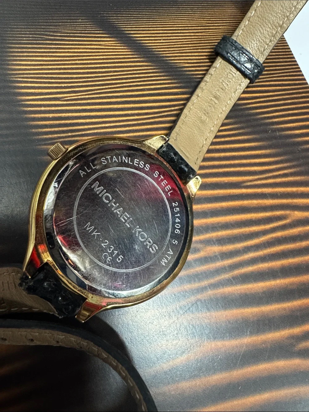 Classic Gold Dial women’s Watch with Black Leather Strap